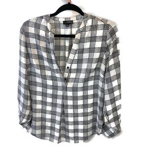 The limited back and white top